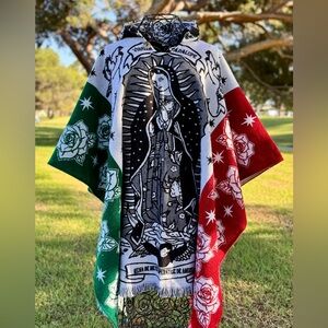 Virgin of Guadalupe alpaca poncho, hooded with wooden buttons. Made in Ecuador